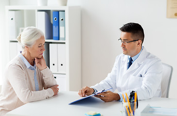 Image showing senior woman and doctor meeting at hospital