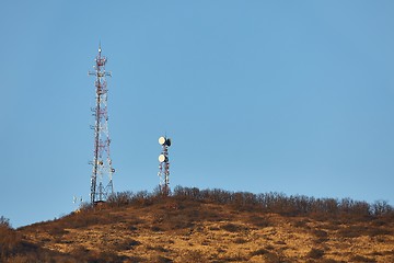 Image showing Transmitter towers on a hill