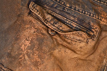 Image showing Trousers with mud