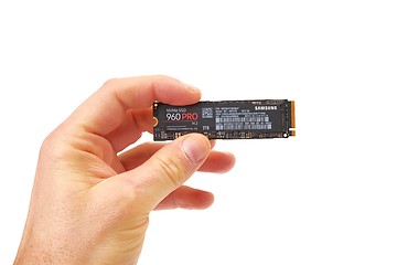 Image showing Circuit Board of an SSD held in hand