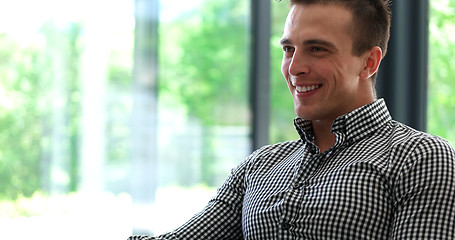 Image showing Happy Man Watching Television