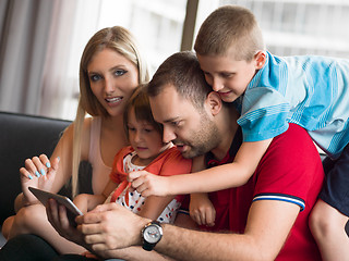 Image showing young cuple spending time with kids