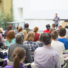 Image showing Man giving presentation in lecture hall at university.