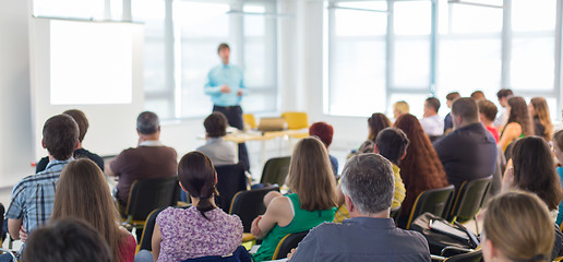 Image showing Speaker giving presentation on business conference.