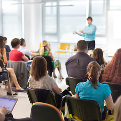 Image showing Speaker giving presentation on business conference.