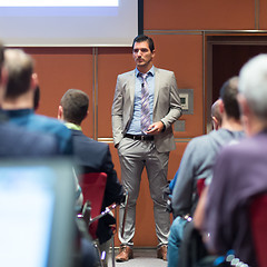 Image showing Speaker Giving a Talk at Business Meeting.