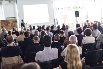 Image showing Business speaker giving a talk at business conference event.