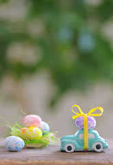 Image showing Toy car carrying easter eggs