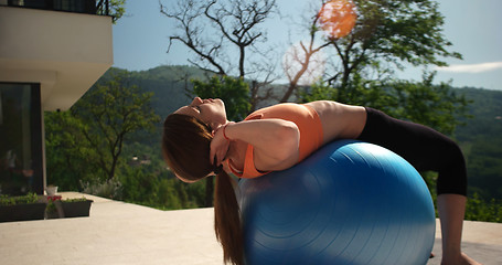 Image showing Woman Doing Yoga at villa\'s terase