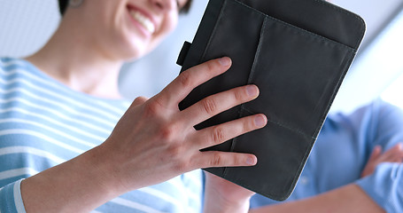 Image showing low angle shot of business people using technology