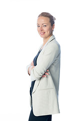 Image showing Business woman standing with arms crossed against white background.