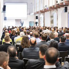 Image showing Business speaker giving a talk at business conference event.