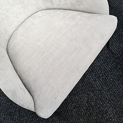 Image showing Empty seat of a simple gray armchair