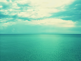 Image showing Retro image of sea and sky in green shades