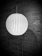 Image showing Round wall lamp in black and white tones