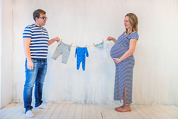 Image showing Young couple: pregnant woman and man