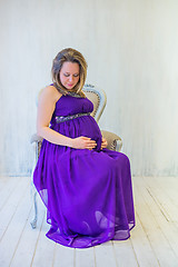 Image showing Beautiful pregnant woman sitting