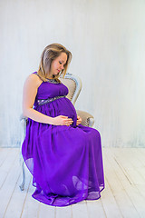 Image showing Beautiful pregnant woman sitting