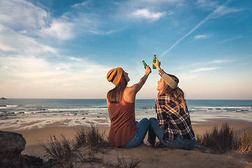 Image showing Making a toast on the beach