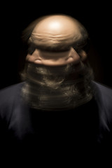 Image showing motion blur portrait of a bearded bald head man