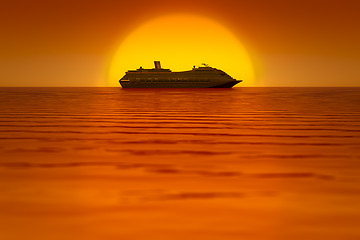 Image showing a cruise ship in front of the sunset sky