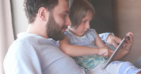 Image showing Father Daughter using Tablet in modern apartment