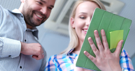 Image showing low angle shot of business people using technology