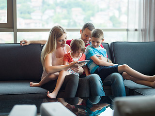 Image showing young cuple spending time with kids