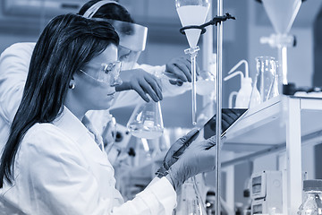 Image showing Chemists researching in life science laboratory.