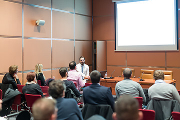 Image showing Skiled Public Speaker Giving a Talk at Business Meeting.