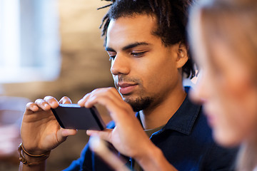 Image showing close up of man with smartphone