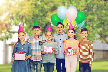Image showing happy children with gifts at birthday party