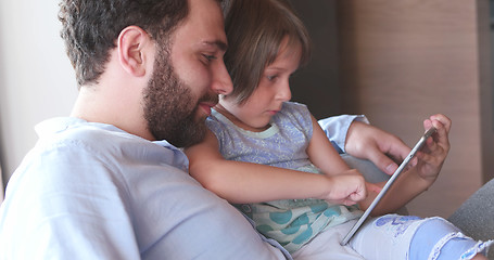 Image showing Father Daughter using Tablet in modern apartment