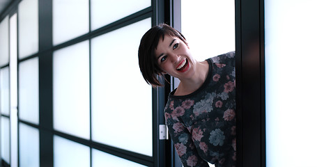 Image showing Business woman having fun in office building