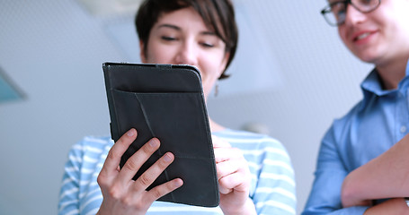 Image showing low angle shot of business people using technology