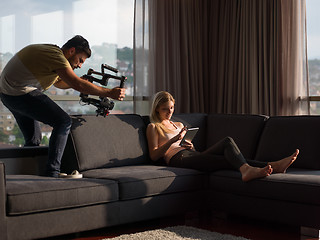 Image showing Woman Using Tablet On Couch At Home