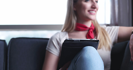 Image showing woman using tablet in beautiful apartment