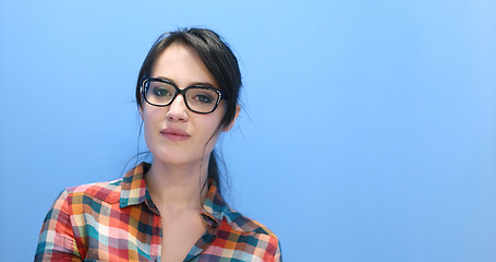 Image showing woman smiling wearing on a pair of large glasses