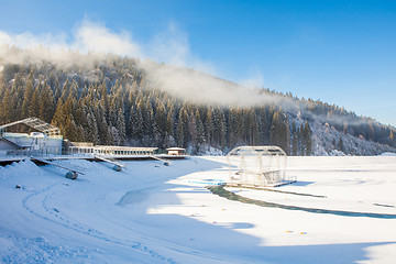 Image showing View of beautiful snowy mountains, forests