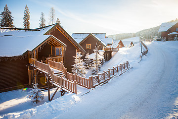 Image showing View of beautiful snowy mountains, forests