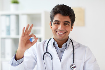 Image showing happy doctor with stethoscope at clinic showing ok