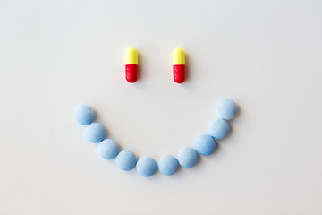 Image showing smiley of different pills and capsules of drugs