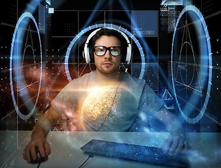 Image showing man in headset with computer virtual projections