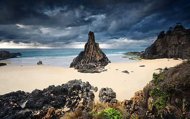 Image showing Moody storm clouds loom over Pyramid sea stack