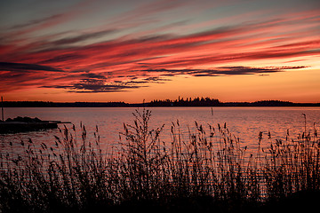 Image showing Crimson sunset on the background of the Gulf of Bothnia