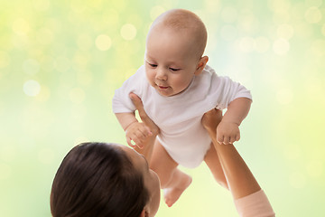 Image showing happy mother playing with little baby boy