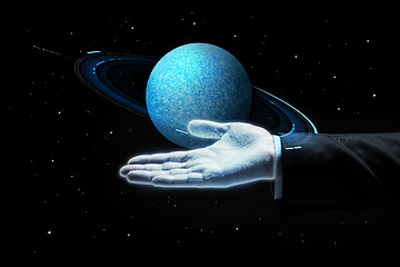 Image showing close up of businessman with planet hologram