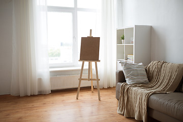 Image showing wooden easel at home room or art studio