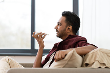 Image showing man using voice command recorder on smartphone