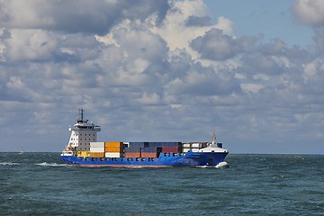 Image showing Ship carrying containers onboard